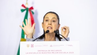 Claudia Sheinbaum, Mexico City's Chief of Government, in a government event where funds were given to citizens for school facilities improvement.