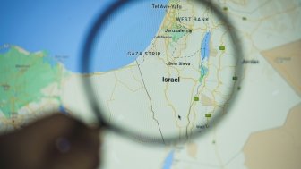 Map of Israel and Vicinity Showing Gaza Strip under a magnifying glass