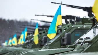 Military and armored vehicles at the International Center for Peacemaking and safety before transferring it into zone of military conflict