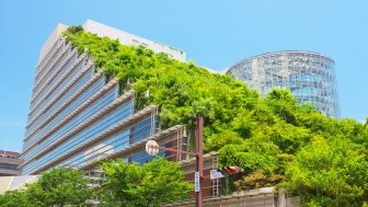 View of Acros Fukuoka on Jul 09, 2015 in Fukuoka, Japan. Acros Fukuoka is the eco-building and landmark of Fukuoka that has a green roof.