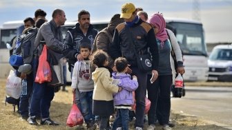 Refugees entering a refugee camp