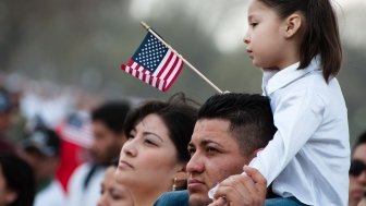 Small girl holding USA flag