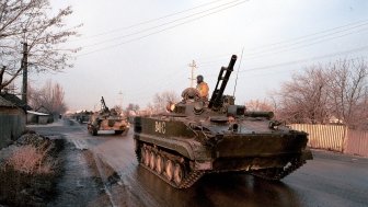  A column of Russian army armor makes its way south from a Russian army base towards the front lines of Chechnya on January 12, 2000 in Mozdok, Russia