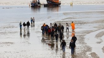 Refugees arriving by boat