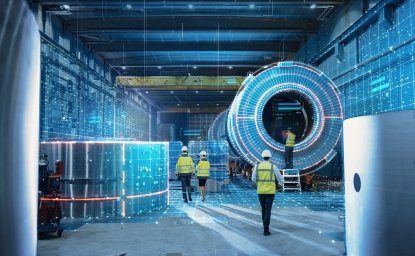 Workers in safety vests in a factory setting surrounded by futuristic technology.