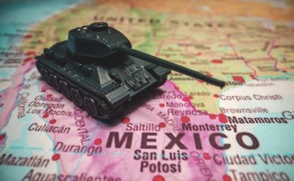 Toy tanks on the map. War on drug cartels in Mexico.