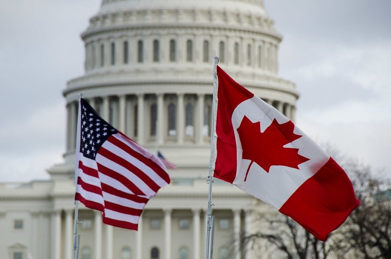 US and Canadian flags at the US Capitol