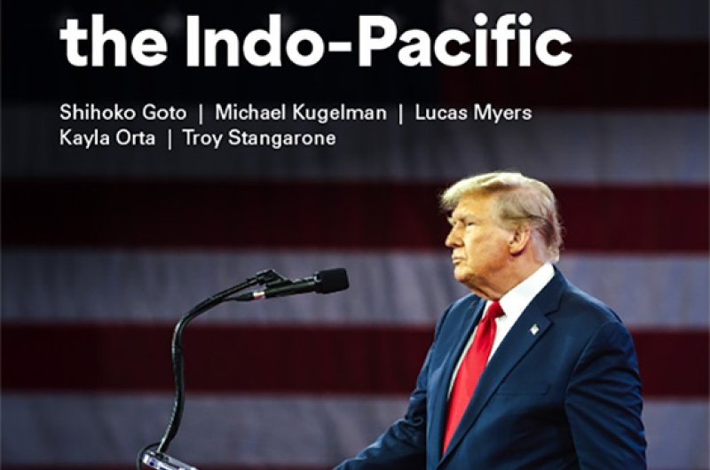 The cover of the publication featuring a photo of Donald Trump at a podium at an event.