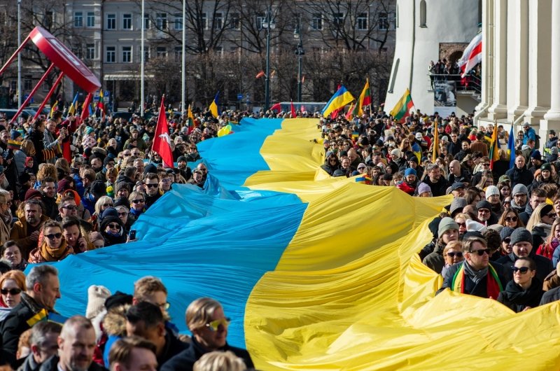 parade with large ukraine flag