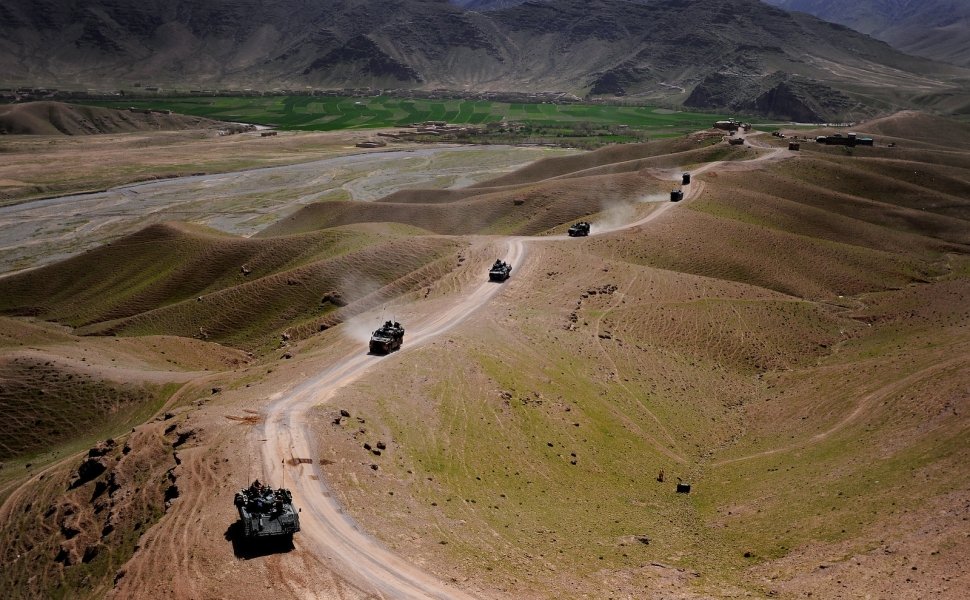 U.S. Air Force members teamed with French military member's convoy across Southern Afghanistan on a resupply mission, March 13, 2010. 