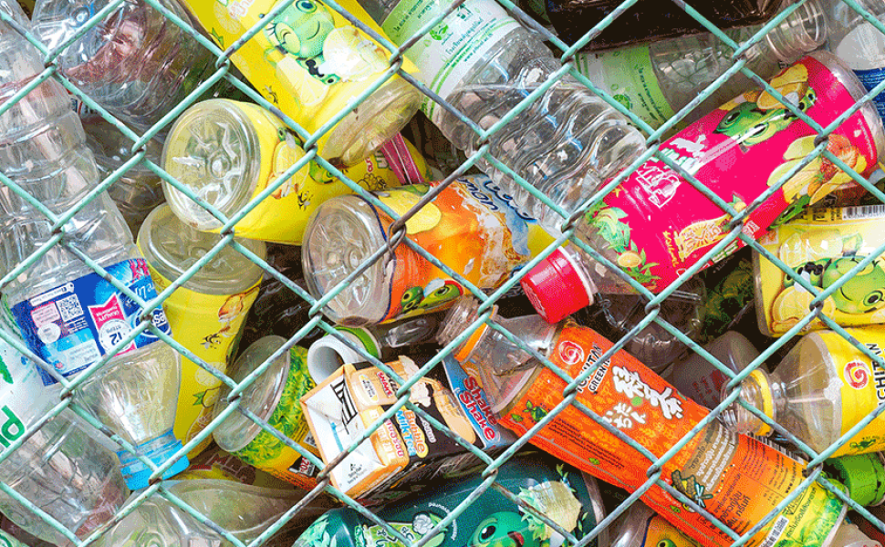  Plastic bottles behind a fence