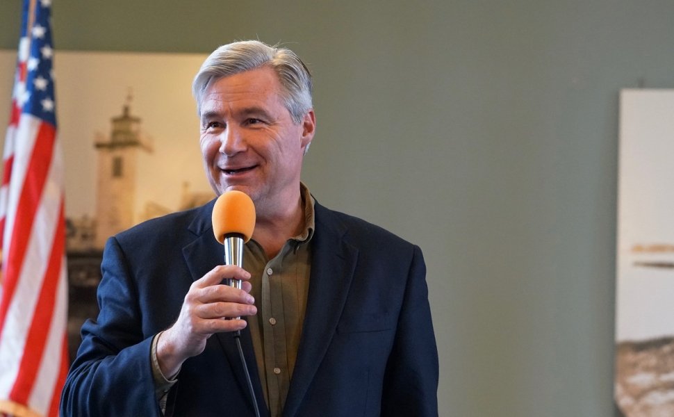 Sen. Sheldon Whitehouse speaks into a microphone