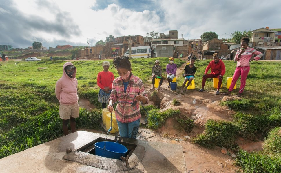 Fenosoa, like many who live in the Amoron’Akona neighborhood, works by supplying dozens of households and businesses with well water in Amoron ‘Akona, Antananarivo, Madagascar