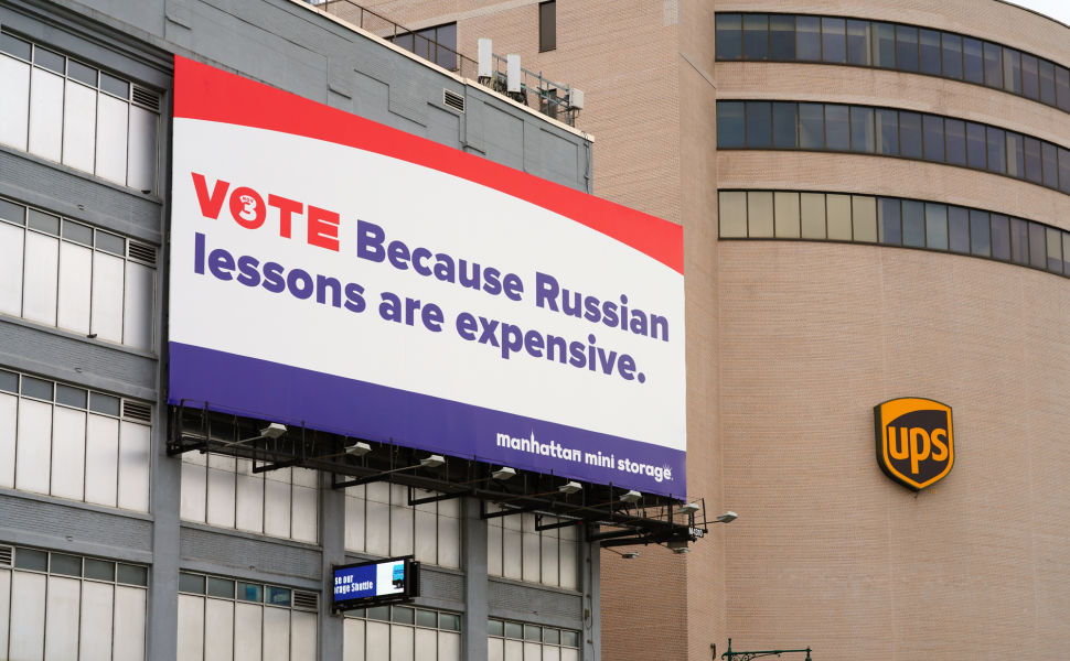 27 SEP 2020- View of a political ad on a billboard saying VOTE because Russian lessons are expensive on a Manhattan Mini Storage building in Manhattan, New York.