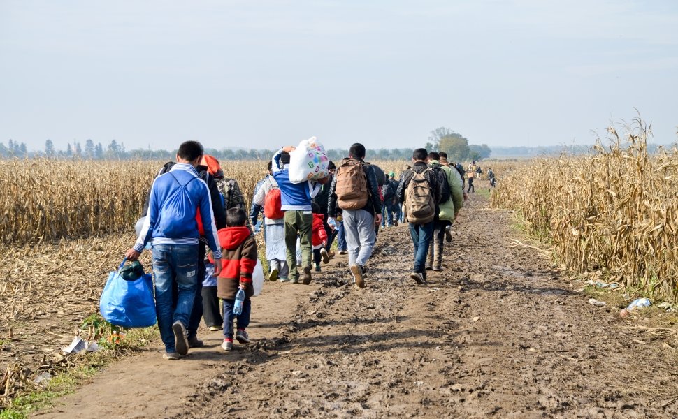 Syrian refugees crossing the border between Serbia and Croatia