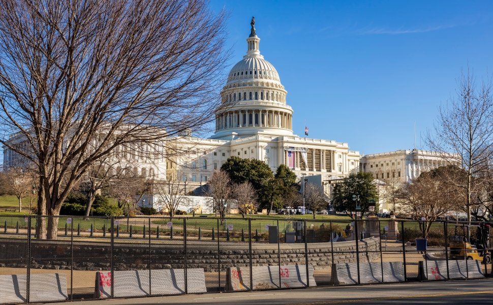 Capitol building behind barricades