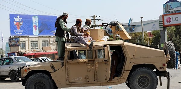 Taliban Fighters in humvee