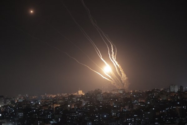 Smoke trails from rockets fired from Gaza at night