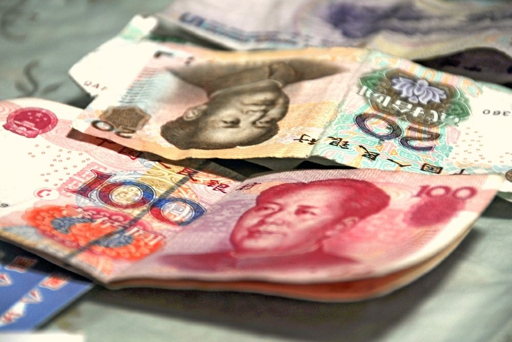 Why doesn't China directly increase RMB usage in International Trade?  (中文）