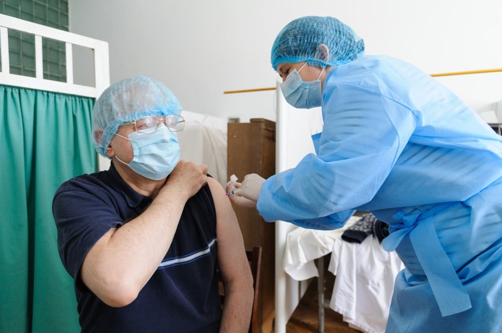 18 march 2021. Lviv, Ukraine. A health worker gets a shot of the AstraZeneca (Covishield) vaccine at the hospital. The Ministry of Health of Ukraine has publicly vaccinated health workers first