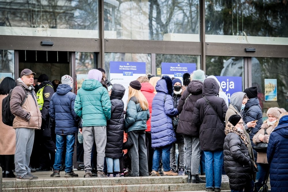 Ukrainian refugees that fleeing from the war in Ukraine gather at a refugee reception center in Riga, Latvia