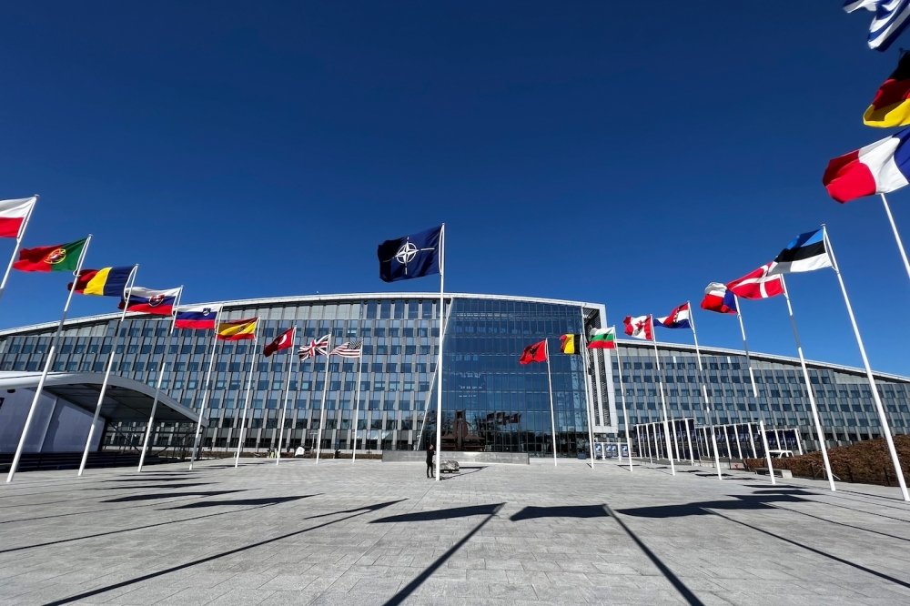 The national flags of NATO member countries outside the organization’s headquarters in Brussels, Belgium