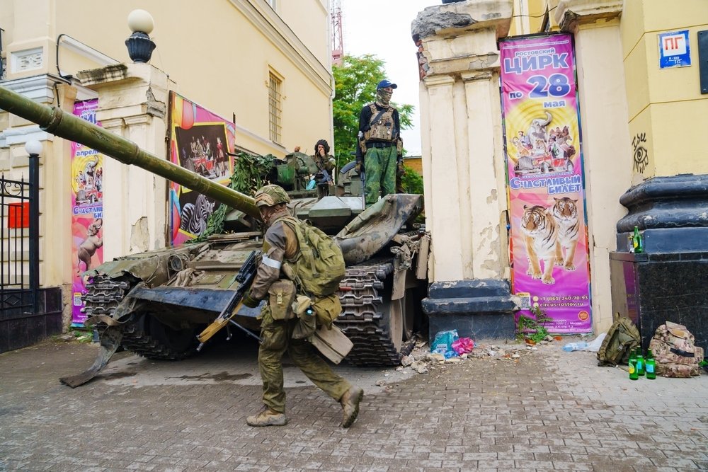 IRPIN, UKRAINE - Mar. 05, 2022: War in Ukraine. Women, old people and children evacuated from Irpin town was transferd to Kyiv by Kyiv territorial defense battalion. War refugees in Ukraine