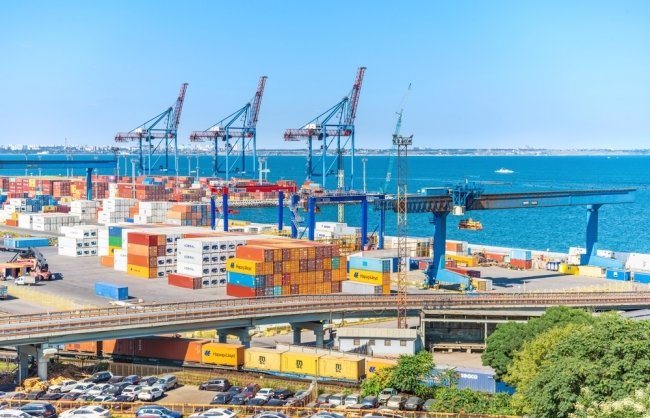 Color containers and cranes in the Odessa city port - the seaport of Ukraine on the Black Sea