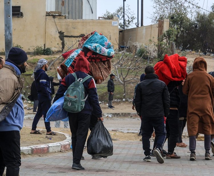 Palestinians are trying to return to their homes and property after the Israeli army withdrew from some areas, on Khan Yunis the southern Gaza Strip, on February 2, 2024.