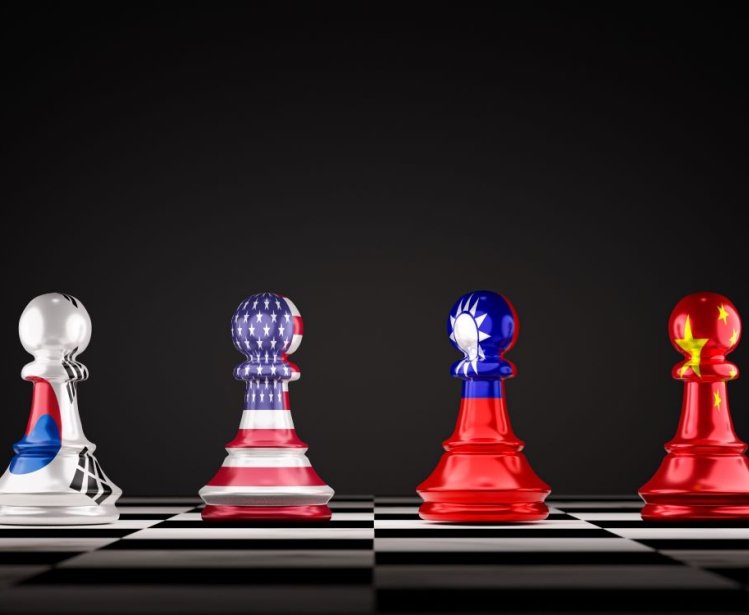 A set of chess pawns showing the flags of Japan, South Korea, The U.S., Taiwan, China, and North Korea