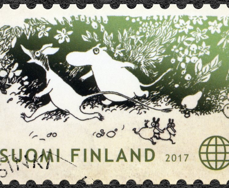 A stamp printed in Finland showing the characters of Tove Jansson's fairy tales.