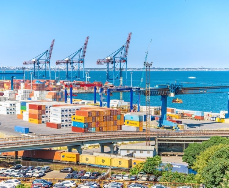 Color containers and cranes in the Odessa city port - the seaport of Ukraine on the Black Sea