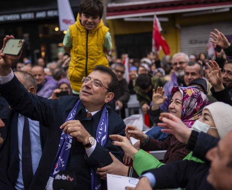 Istanbul Mayor and Republican People's Party, or CHP, candidate Ekrem Imamoglu take photographs with supporters during a campaign rally in Istanbul, Turkey, Thursday, March 21, 2024. Turkey was coming to terms on Monday with the opposition's unexpected success in local elections which saw it outperform President Recep Tayyip Erdogan's ruling party and add to municipalities gained five years ago.