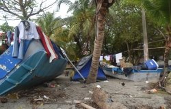 Migrants camp in Necoclí before crossing the Darién Gap