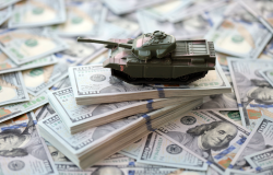 Tank sits on top of $100 bills