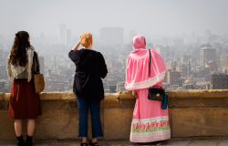 Cairo, Egypt, February 2020 three women overlooking the skyline of cairo