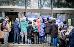 Ukrainian refugees that fleeing from the war in Ukraine gather at a refugee reception center in Riga, Latvia