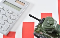 image of a calculator and toy tank