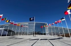 The national flags of NATO member countries outside the organization’s headquarters in Brussels, Belgium